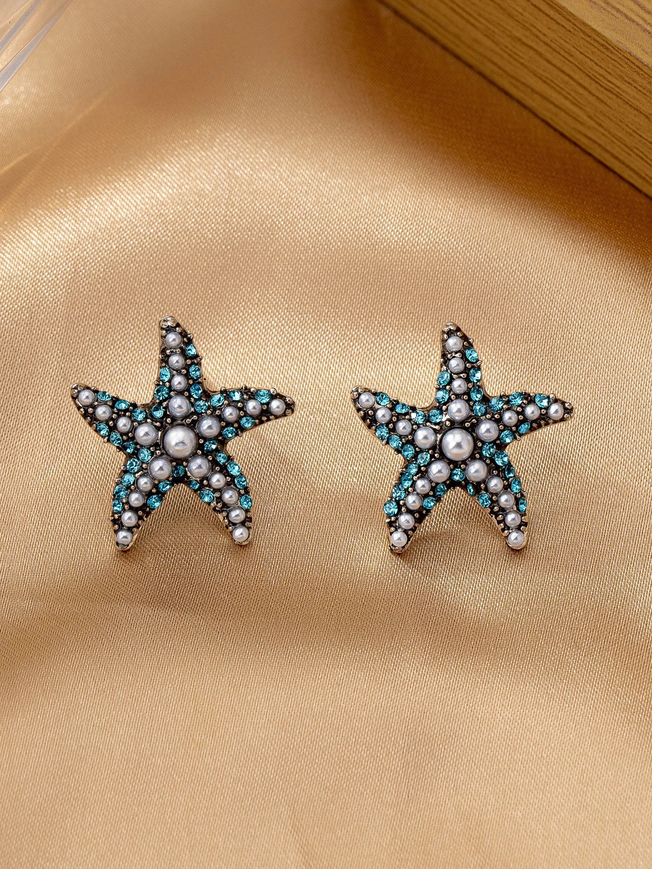 עגילים דגם ים